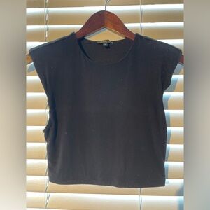 Dynamite crop top with shoulder pads. Size small